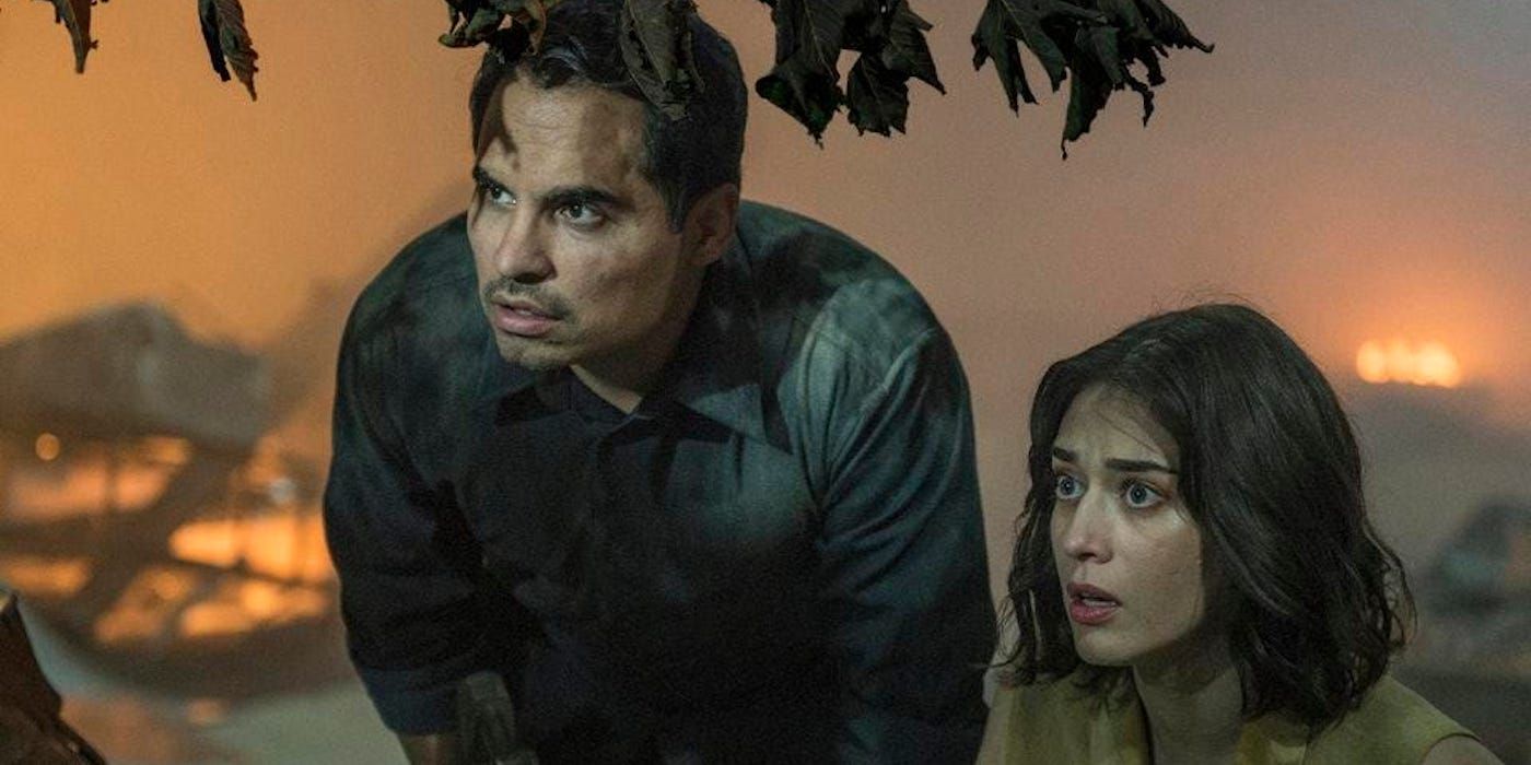 Michael Peña and Lizzy Caplan in Extinction