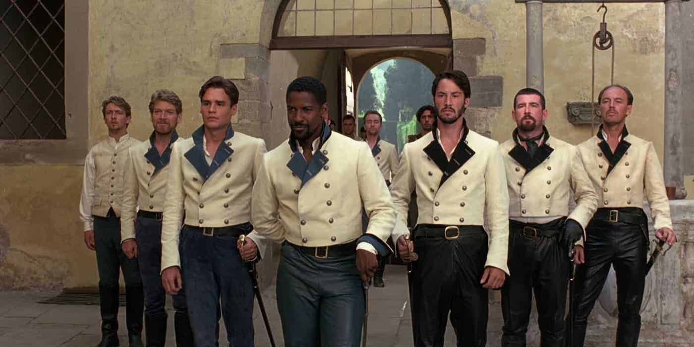 Don Pedro, played by Denzel Washington, walks with his nobles in Much Ado About Nothing.
