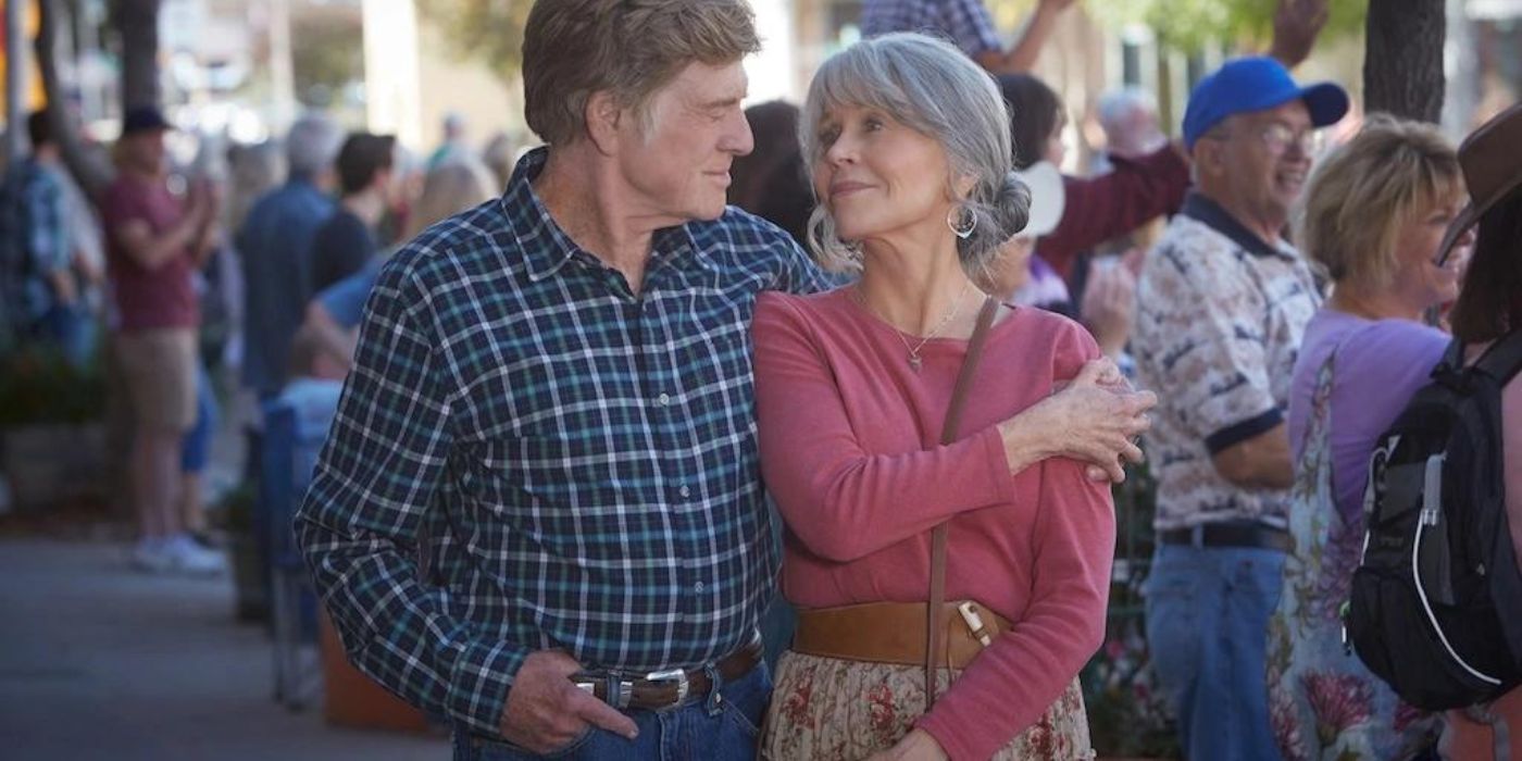 Robert Redford and Jane Fonda as Louie and Addie walk hugging in Our Souls at Night.