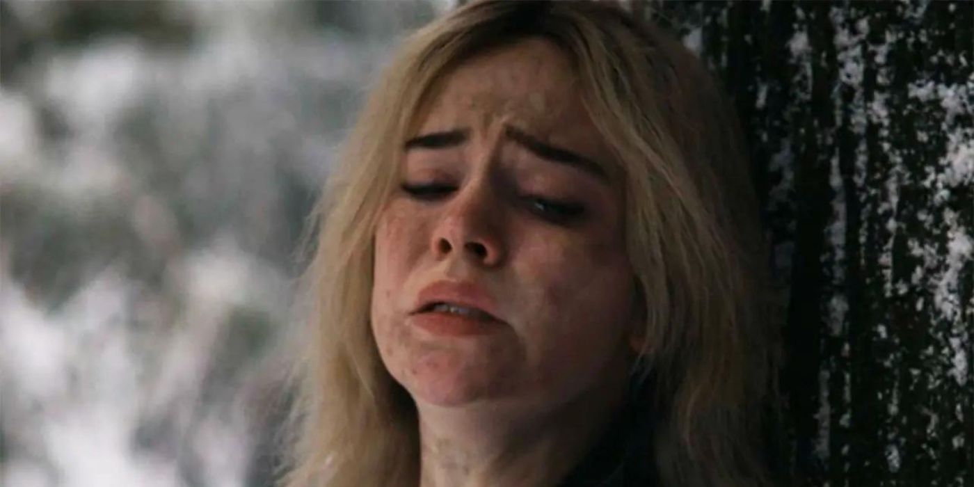 Natalie (Sophie Thatcher) is terrified in the woods as the girls chase after her during the Yellow Jacket sacrifice scene, season 2, episode 8.