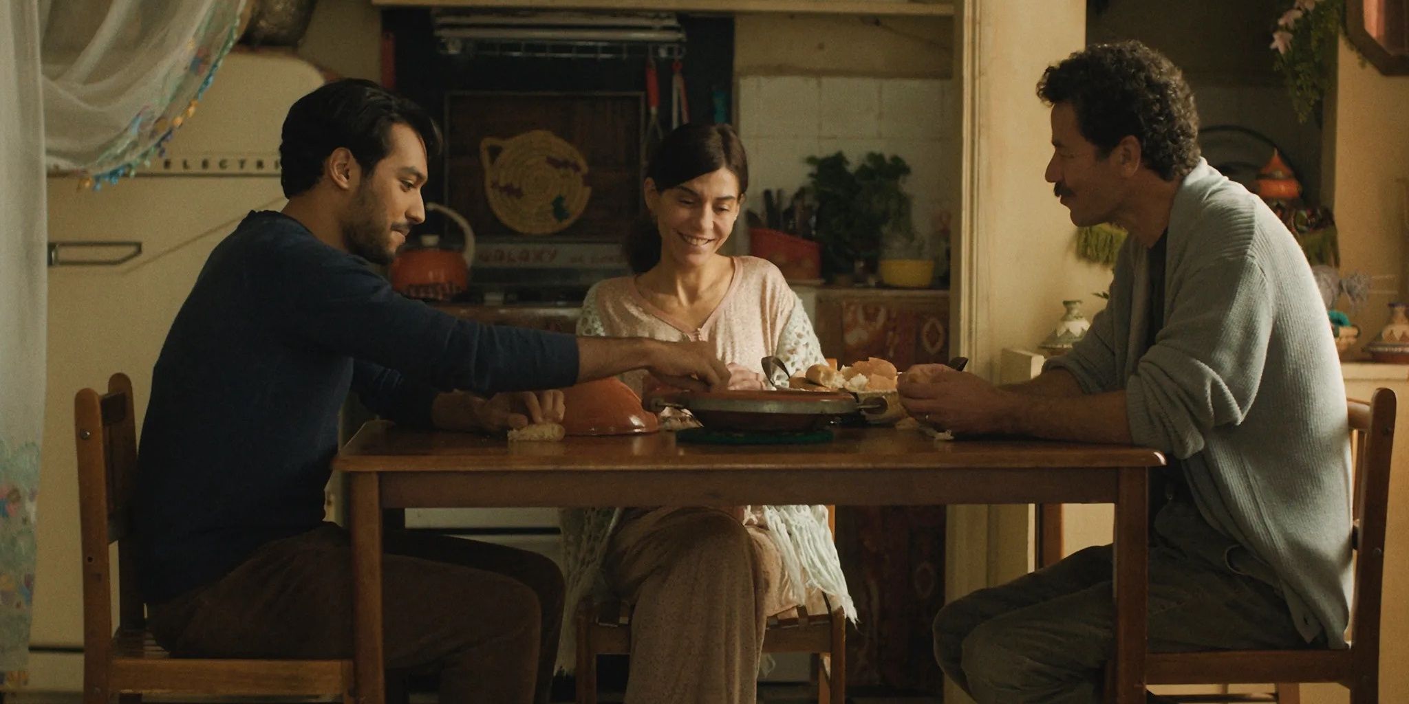 The love triangle begins at the dinner table