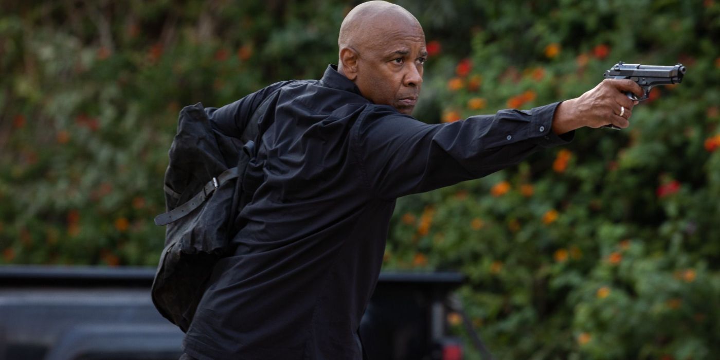 Robert McCall (Denzel Washington) points a gun in The Equalizer 3